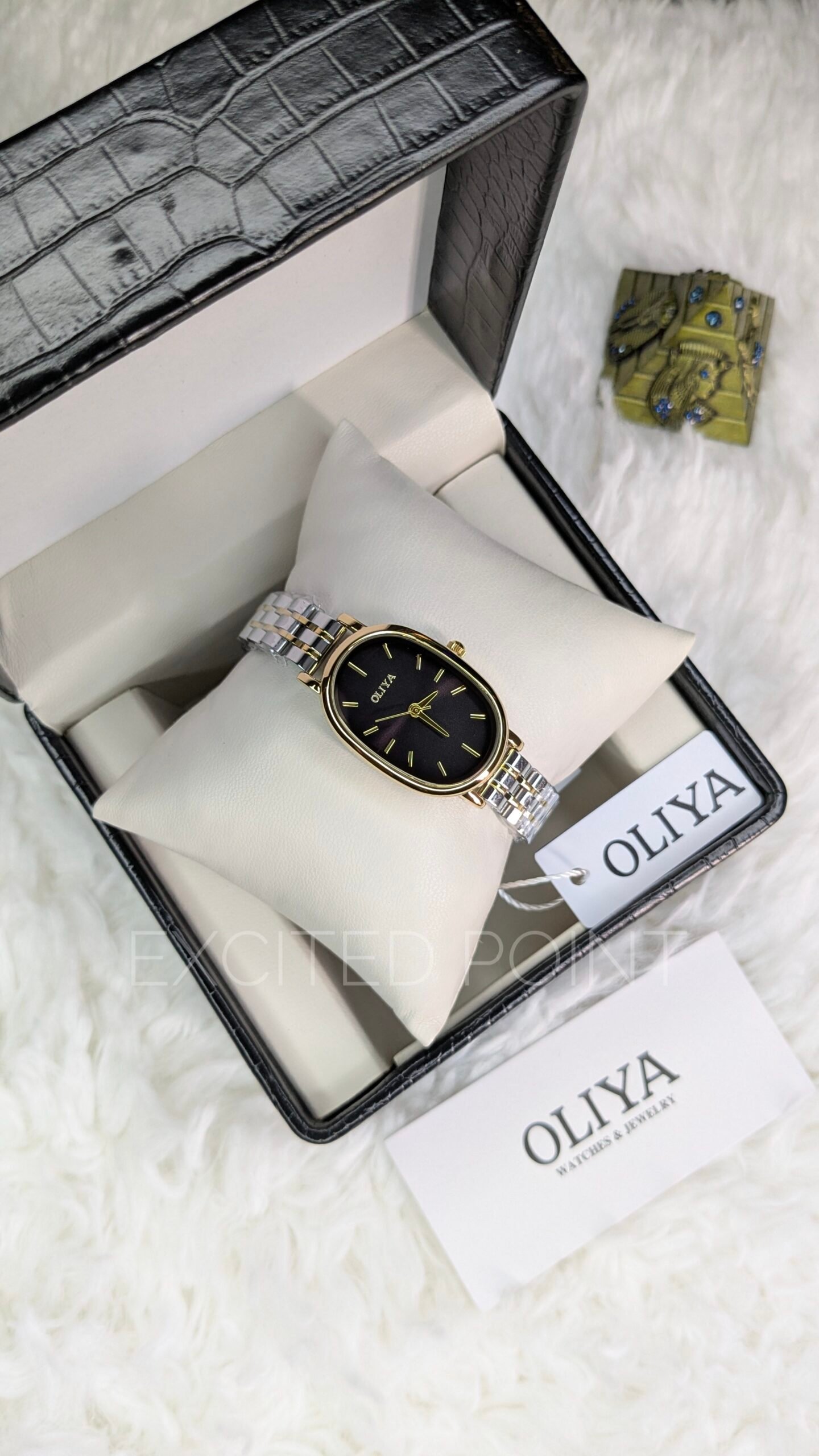38821 OLIYA 2015 Official Women’s Oval Quartz Watch – Classic Stainless Steel Fashion Wristwatch - Image 1